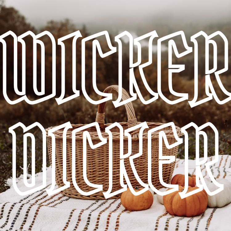 Wicker Dicker text overlaid on a wicker picnic basket on a blanket with pumpkins.