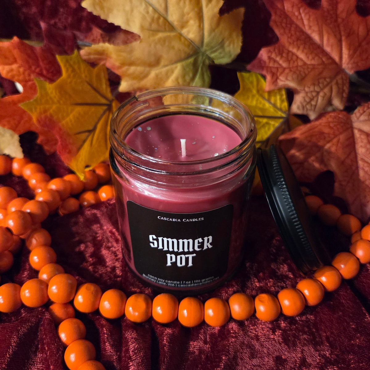 Top-down view of Simmer Pot candle showing silver holographic eco-friendly glitter on top.