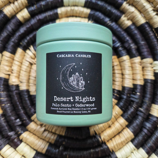 Cascadia Candles Desert Nights candle on a woven mat
