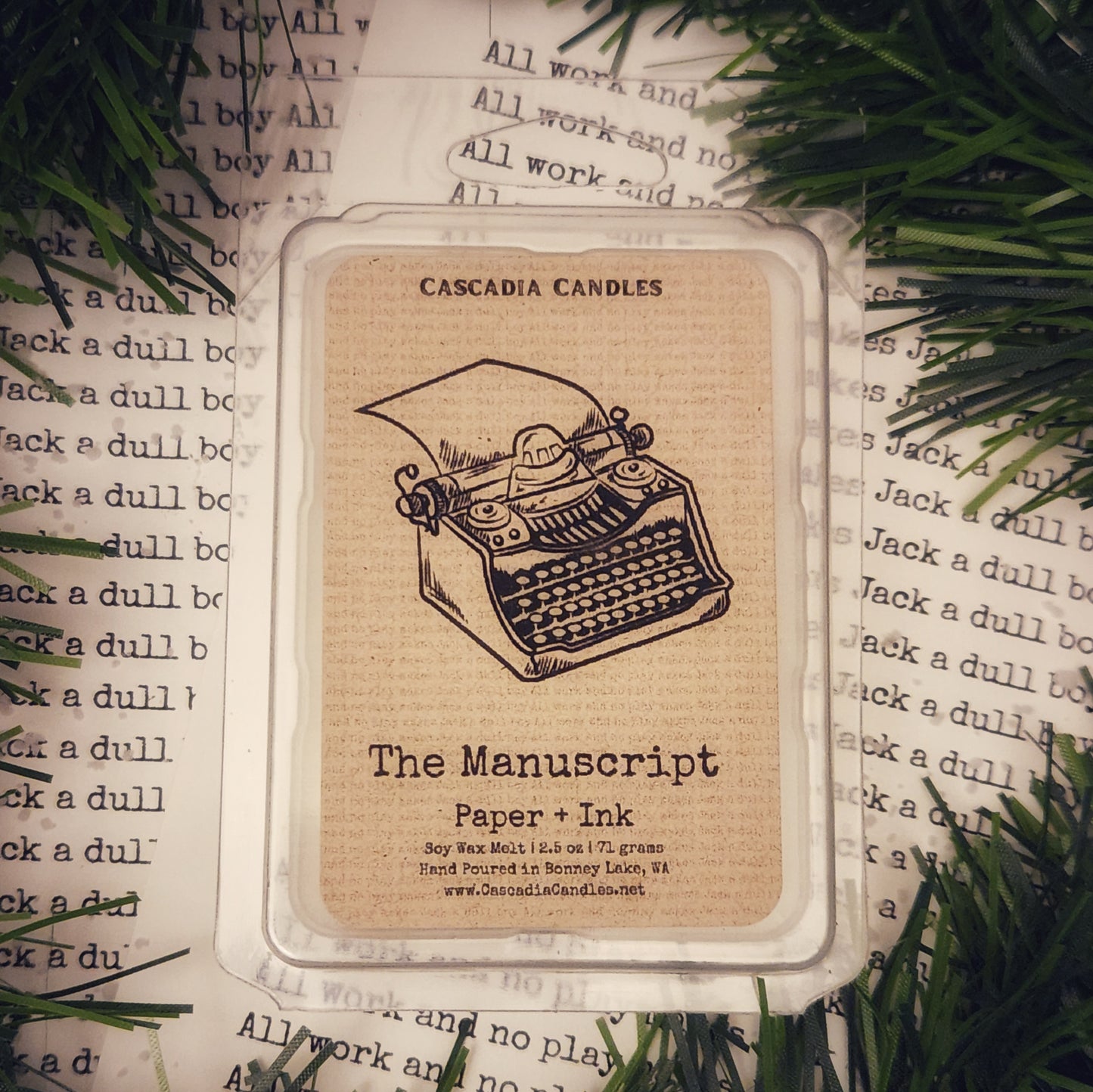 Cascadia Candles The Manuscript wax melt packaging with typewriter design on a textured paper background